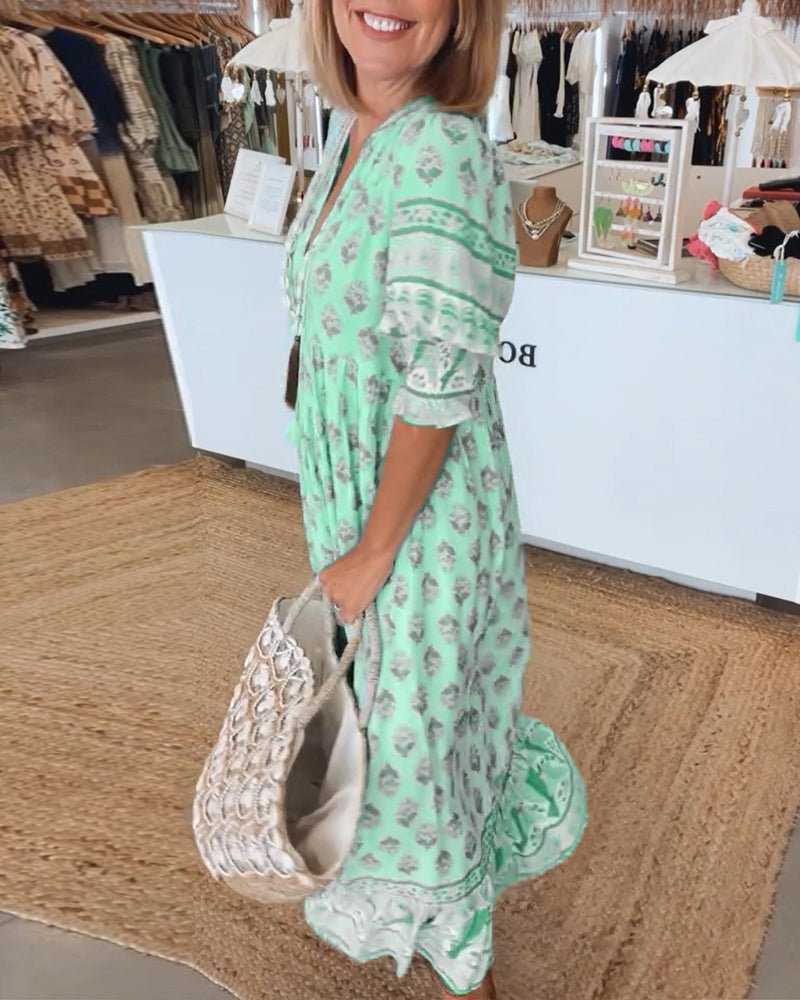 マナ | シックなフローラルVネックドレス